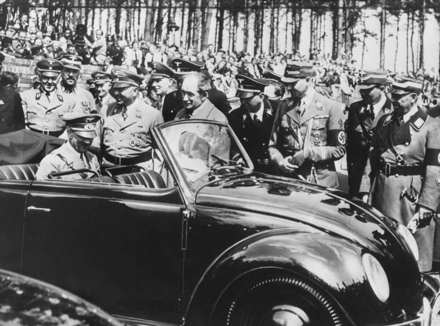 German chancellor Adolf Hitler seated in the very first Volkswagen Beetle model in Stuttgart, Germany