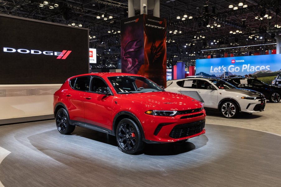 A red 2023 Dodge Hornet at the 2023 New York International Auto Show (NYIAS). The 2024 Hyundai Tucson vs. 2024 Dodge Hornet is a hot debate.