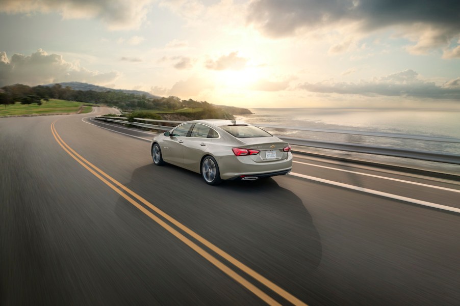 Rear 3/4 view of the 2024 Chevrolet Malibu Premier 1LZ in Mineral Gray Metallic. Chevy Malibu sales are on the upswing.