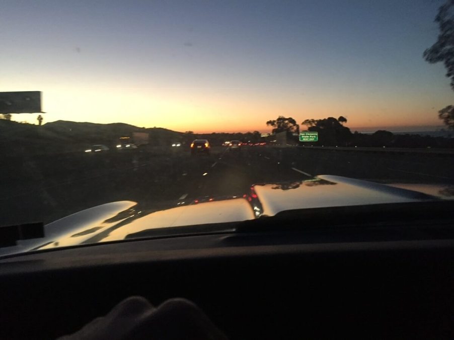 I drove my classic car, a 1967 Chevrolet Camaro, at sunset on I5 in Southern California.