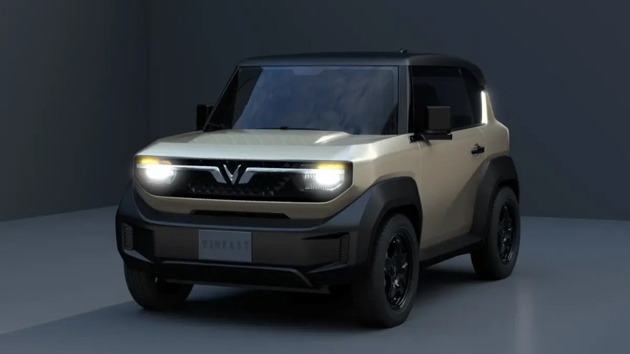 VinFast VF3 mini EV SUV studio shot with lights on