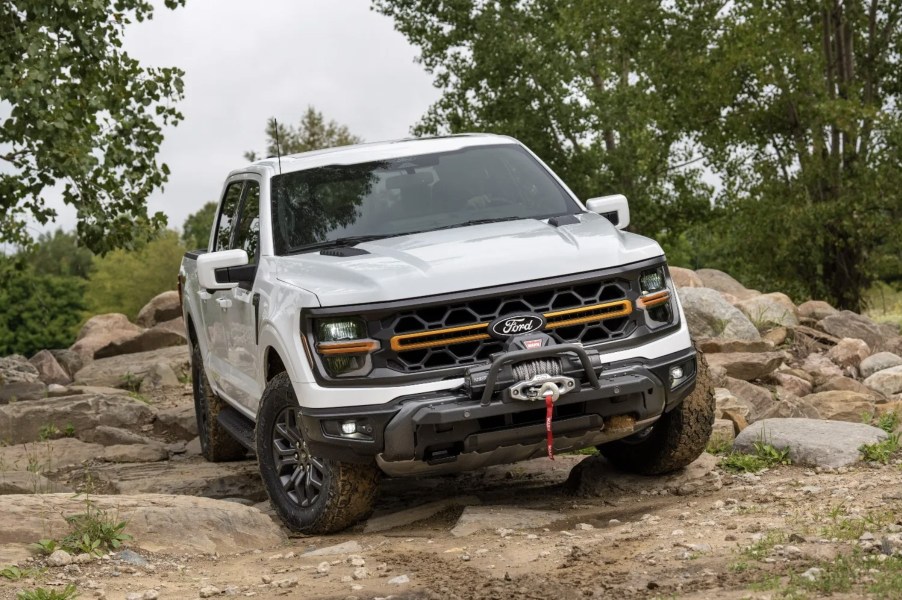 The 2024 Ford F-150 Tremor off-roading in dirt