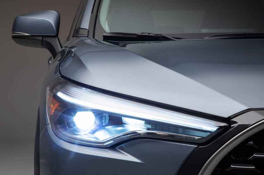 A close right front view of a silvery blue 2023 Toyota Corolla Cross