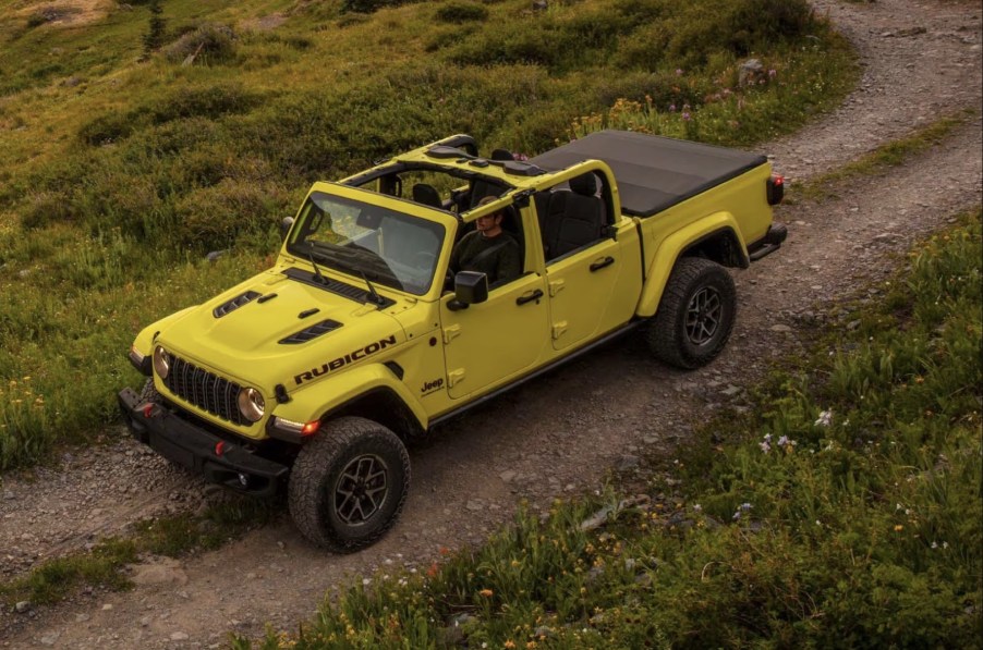 The 2024 Jeep Gladiator off-roading in mud