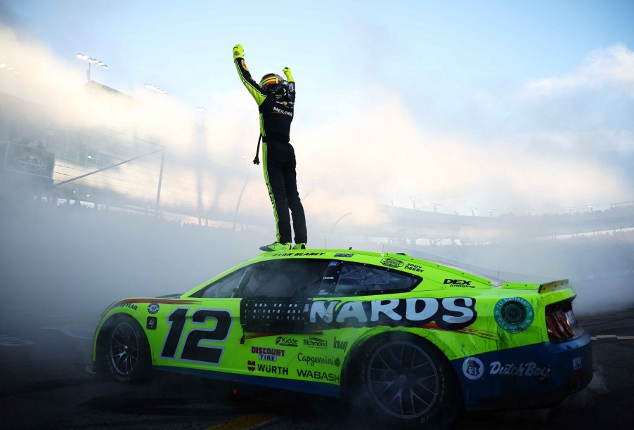 Ryan Blaney celebrates winning the 2023 NASCAR Cup Series championship at Phoenix.