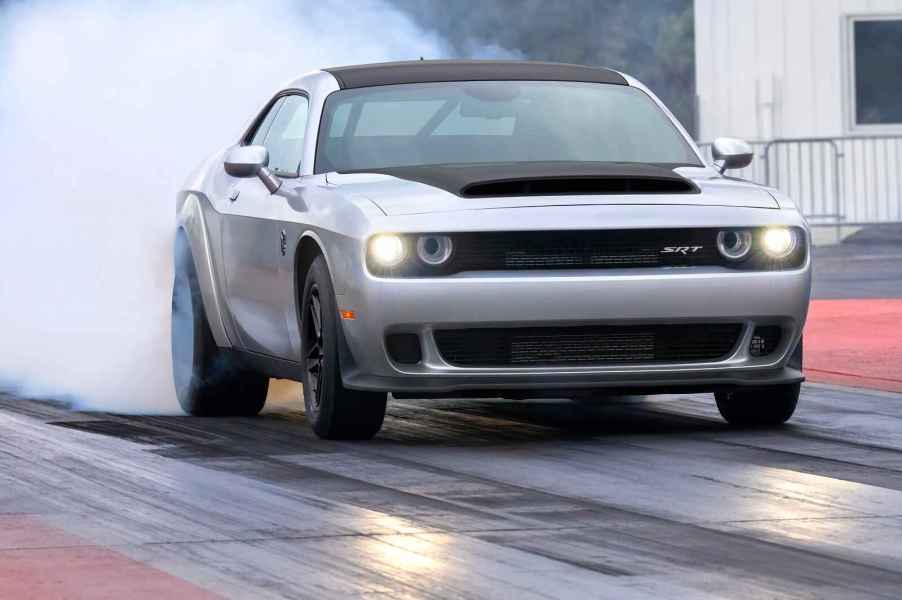 A silver and black 2023 Dodge Challenger SRT Demon 170 on a quarter-mile drag strip.