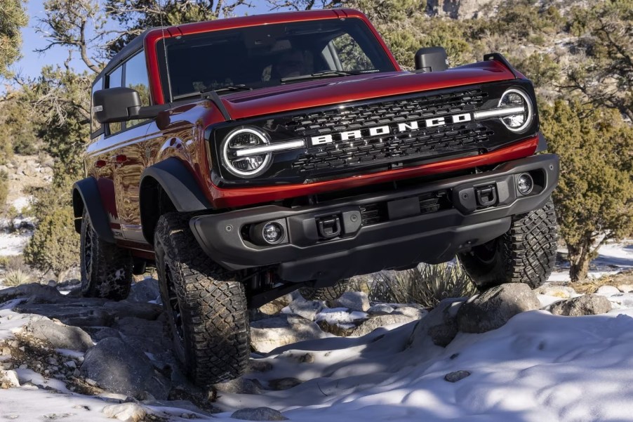 The 2024 Ford Bronco crawling over rocks