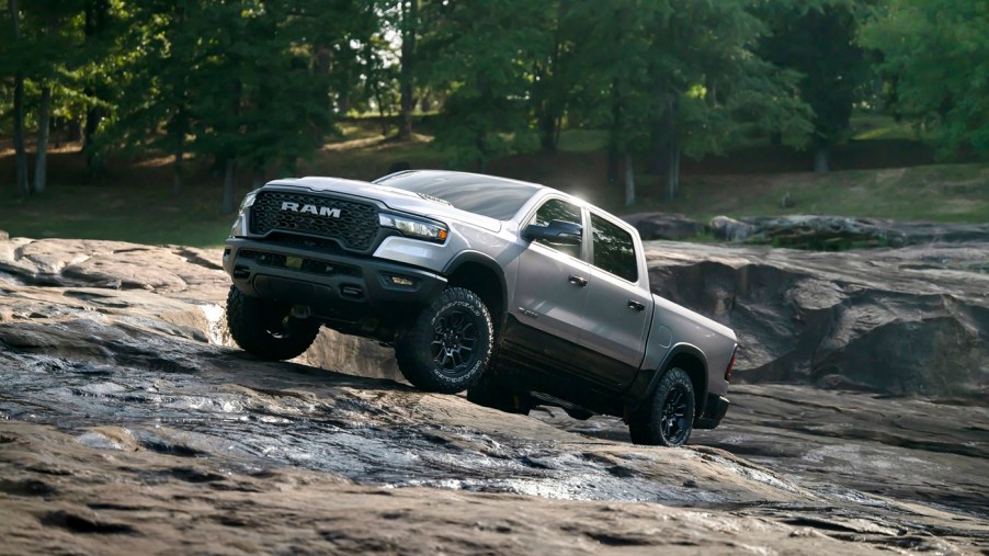 The 2025 Ram 1500 Rebel climbing over rocks