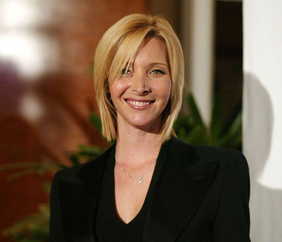 Lisa Kudrow smiles at an event.