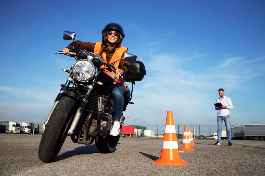 A student rides on a course before earning a motorcycle license.