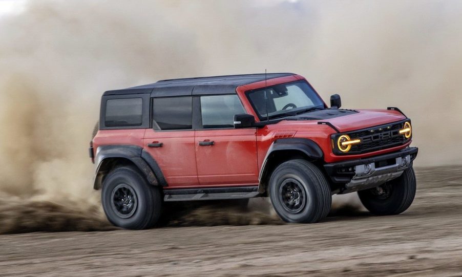 The 2024 Ford Bronco Raptor kicking up dirt