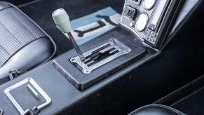 The black interior of a 1972 De Tomaso Pantera classic Italian supercar.