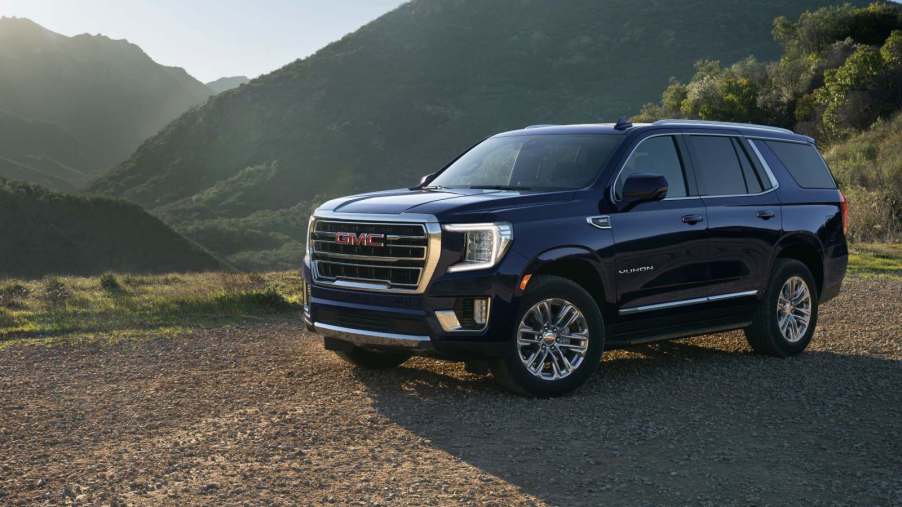 A person traded in a 2023 GMC Yukon for a used Chevy Suburban. Both are among the Top SUVs