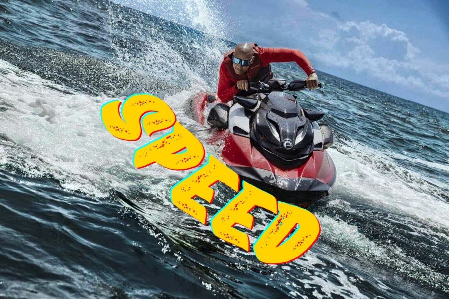 A rider on a Sea-Doo RXP-X jet ski PWC kicks up spray.