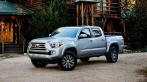 The 2023 Toyota Tacoma parked near a home