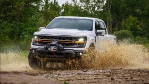 The 2024 Ford F-150 kicking up mud