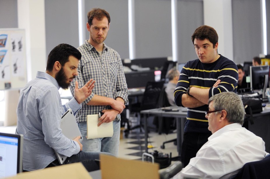 Rimac CEO Mate Rimac sits with his engineers, discussing the Neverra