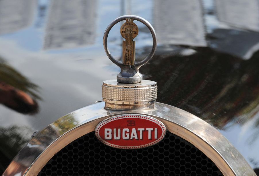 Logo of a vintage Bugatti Grand Prix car