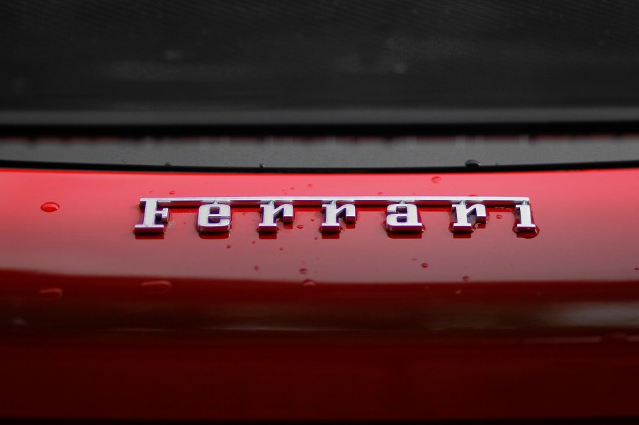 Ferrari lettering on a red car the Ferrari EV is rumored to start at over half a million dollars