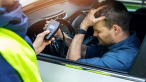 A man getting a breathalyzer test