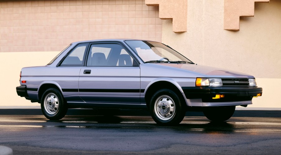 A blue 1989 Toyota Tercel coupe parked in right profile angle