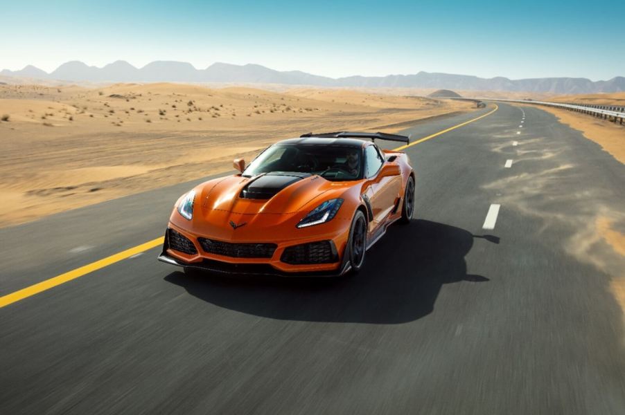 An orange 2019 Chevrolet Corvette ZR1 blasts across the desert.