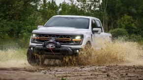 The 2024 Ford F-150 kicking up mud