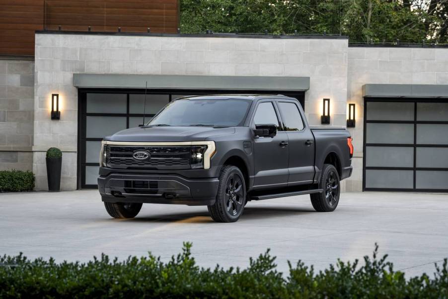 A 2024 Ford F-150 Lightning parked in the driveway