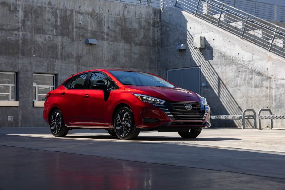 Bright red Nissan Versa subcompact sedan