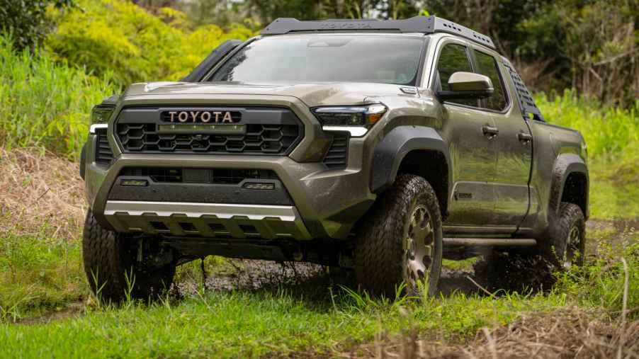 The 2024 Toyota Tacoma off-roading in a field