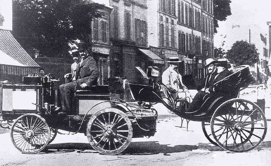 The Count de Dion driving his steam engine, the fastest vehicle in the first auto race through Paris.