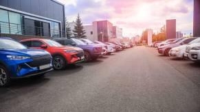 A dealership shows off new cars and trade-in models.