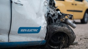 EV crash damage in close view modern U.S. guardrail systems will not stop EVs