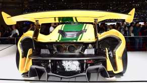 Rear of a bright yellow McLaren P1 race car.