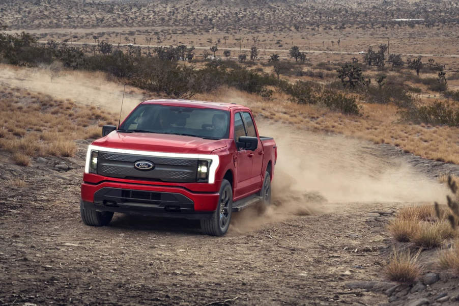 The 2024 Ford F-150 Lightning kicking up mud