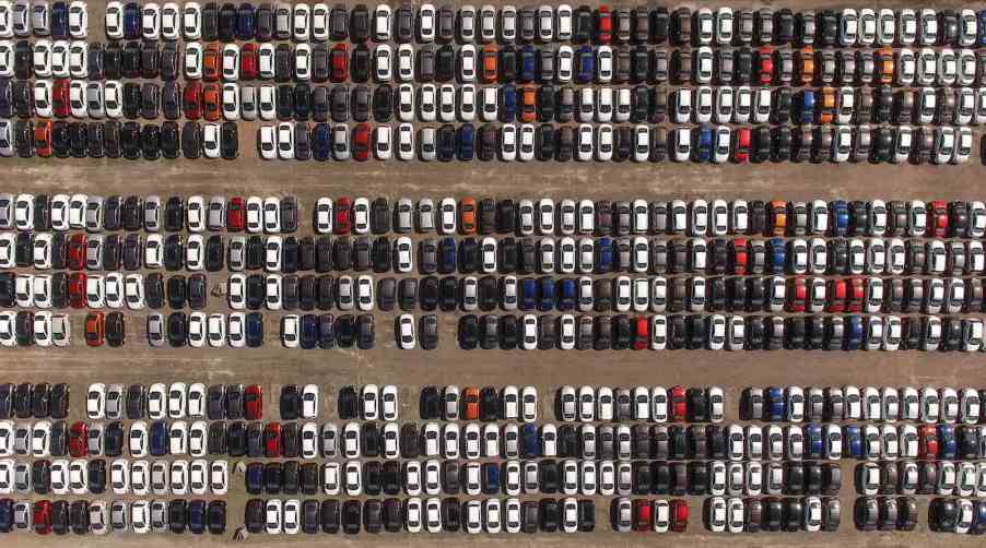 Aerial view of a factory parking lot.