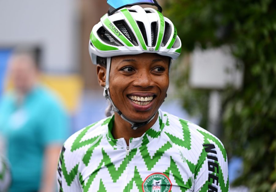 A bicyclist from Nigeria smiles during a tournament in Scotland