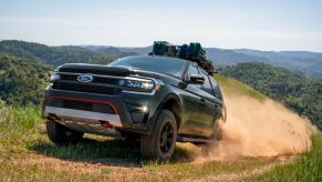 The 2024 Ford Expedition off-roading on a dirt road