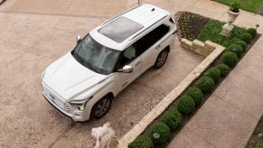 A white 2024 Toyota Sequoia, one of the fastest-selling cars in the U.S. in Q3 2024, in left low aerial view