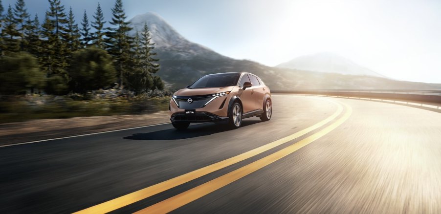 A Nissan Ariya, one of the EVs with an IIHS Top Safety Pick rating, takes a corner.