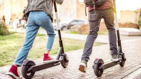 These young commuters could risk a DUI on a scooter if they drink and ride.