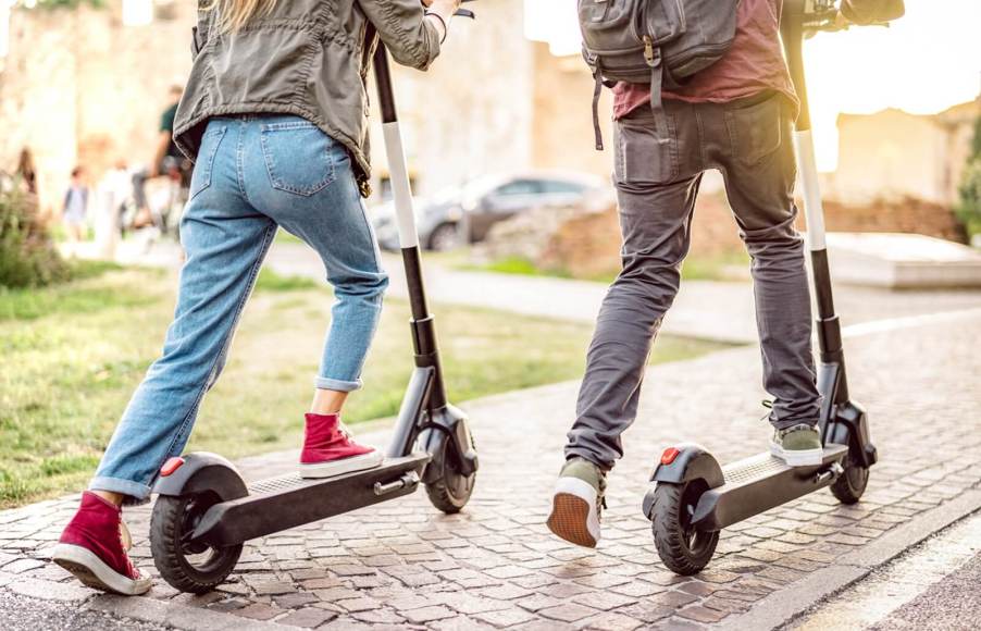 These young commuters could risk a DUI on a scooter if they drink and ride.