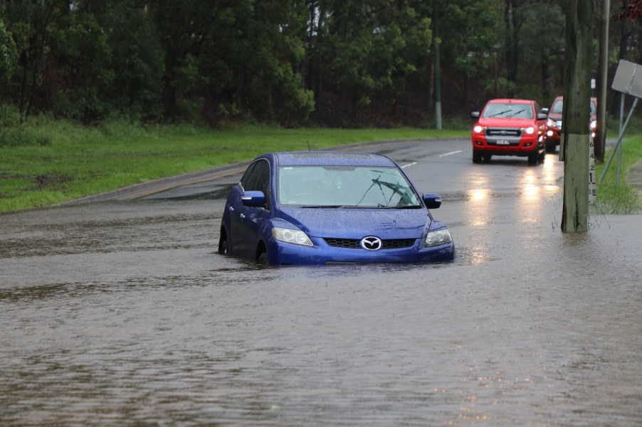 A car standard in flood water