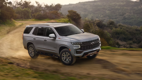 The 2024 Chevy Tahoe on a dirt road