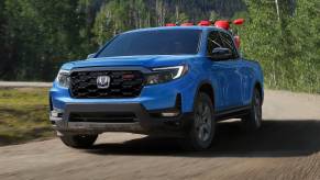 The 2024 Honda Ridgeline on a dirt road