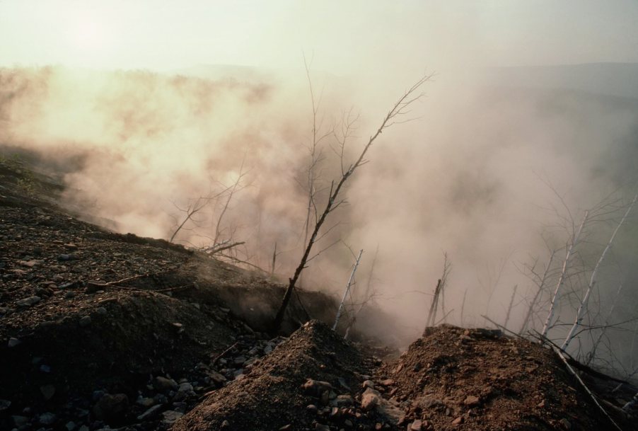 Smoke covers a mountainside as a coal fire burns beneath Centralia, Pennsylvania