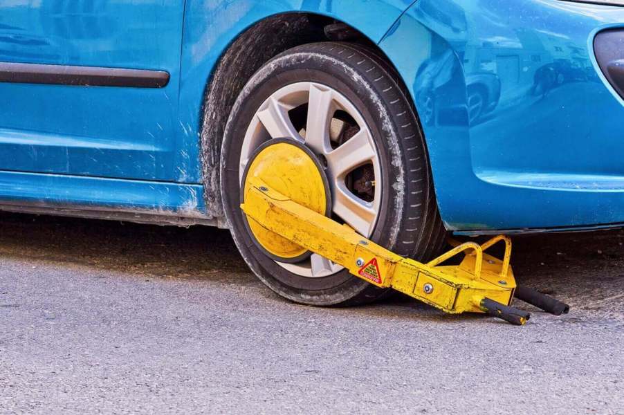 A driver may wonder how to remove a boot like this one from their car.