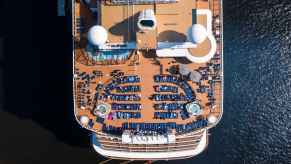 An aerial view of a cruise ship deck with hot tub