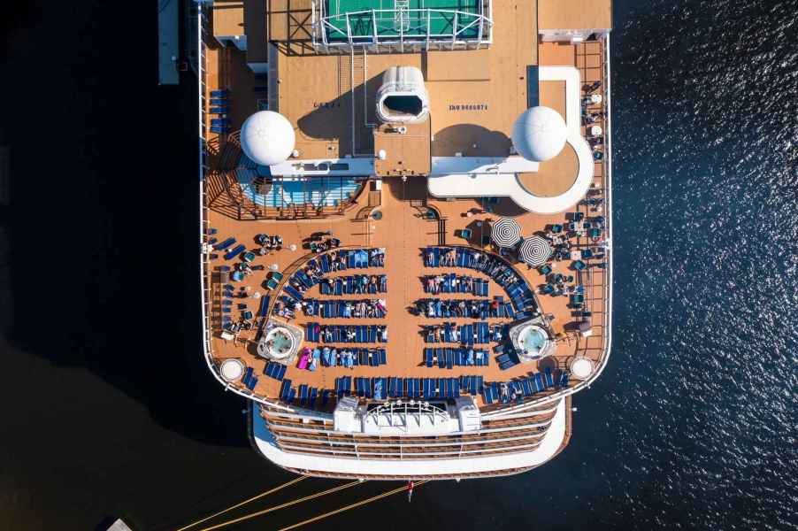 An aerial view of a cruise ship deck with hot tub