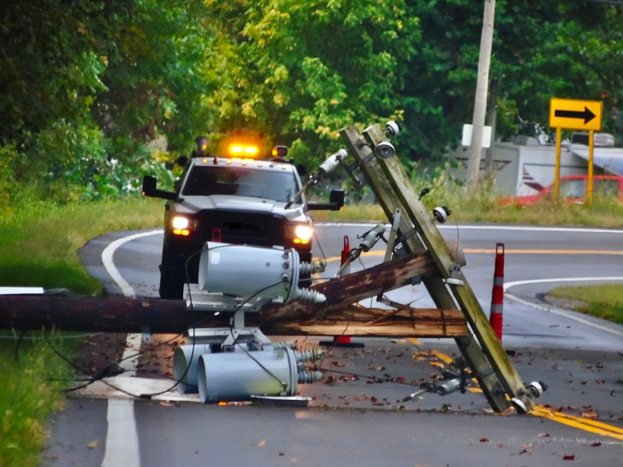 A truck at the scene of a downed power line